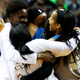Minnesota Lynx player Maya Moore (right) and teammates celebrate after they win the WNBA Finals championship on Oct. 4, 2017, in Minneapolis. (Jim Mone/AP Images)